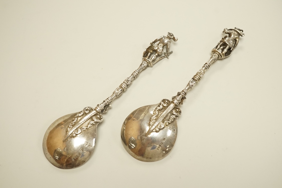 A pair of late 19th century Hanau silver spoons, with warrior finials, import marks for John George Smith, London, 1898, 18.6cm, 5oz.